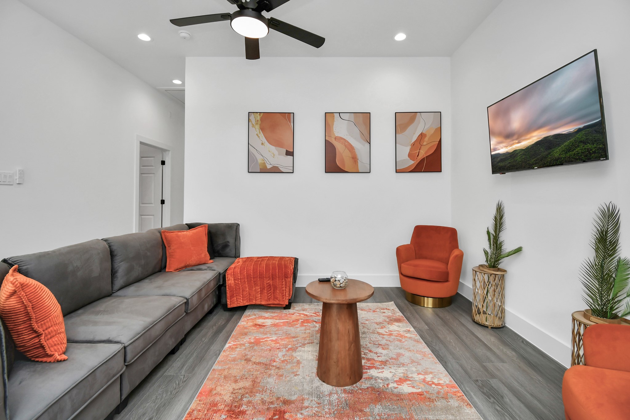 4909 Higgins Street, Unit A Houston, TX 77033 - Photo 11 of 32 a living room with furniture and a flat screen tv