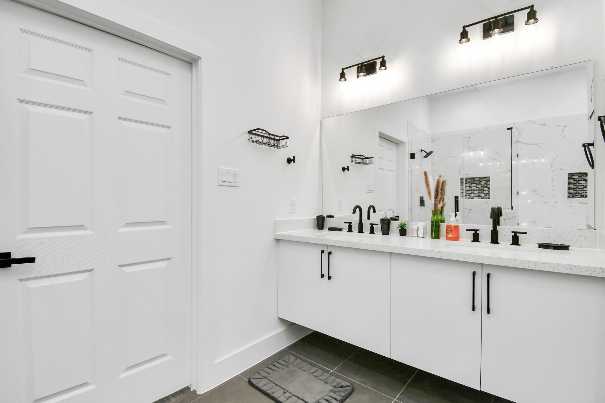4909 Higgins Street, Unit A Houston, TX 77033 - Photo 21 of 32 a kitchen with a sink and cabinets
