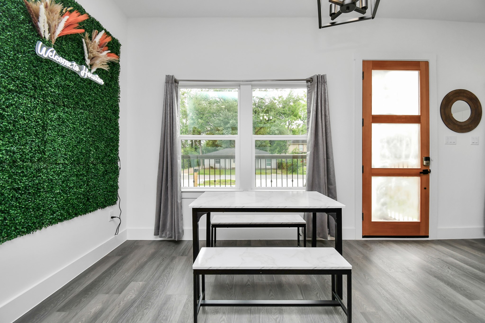 4909 Higgins Street, Unit A Houston, TX 77033 - Photo 8 of 32 a room with wooden floor pool table and windows