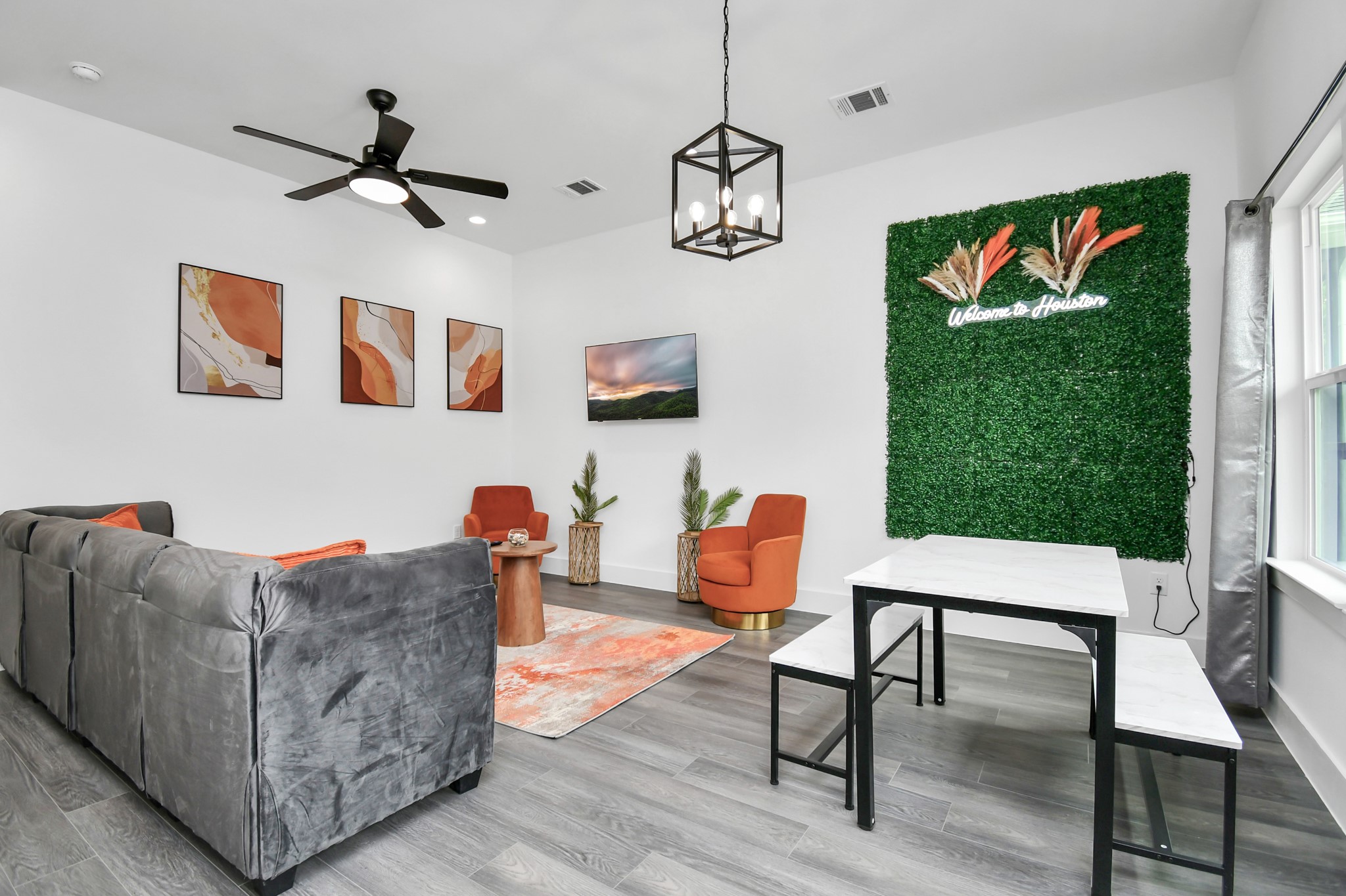 4909 Higgins Street, Unit A Houston, TX 77033 - Photo 9 of 32 a living room with furniture and a window