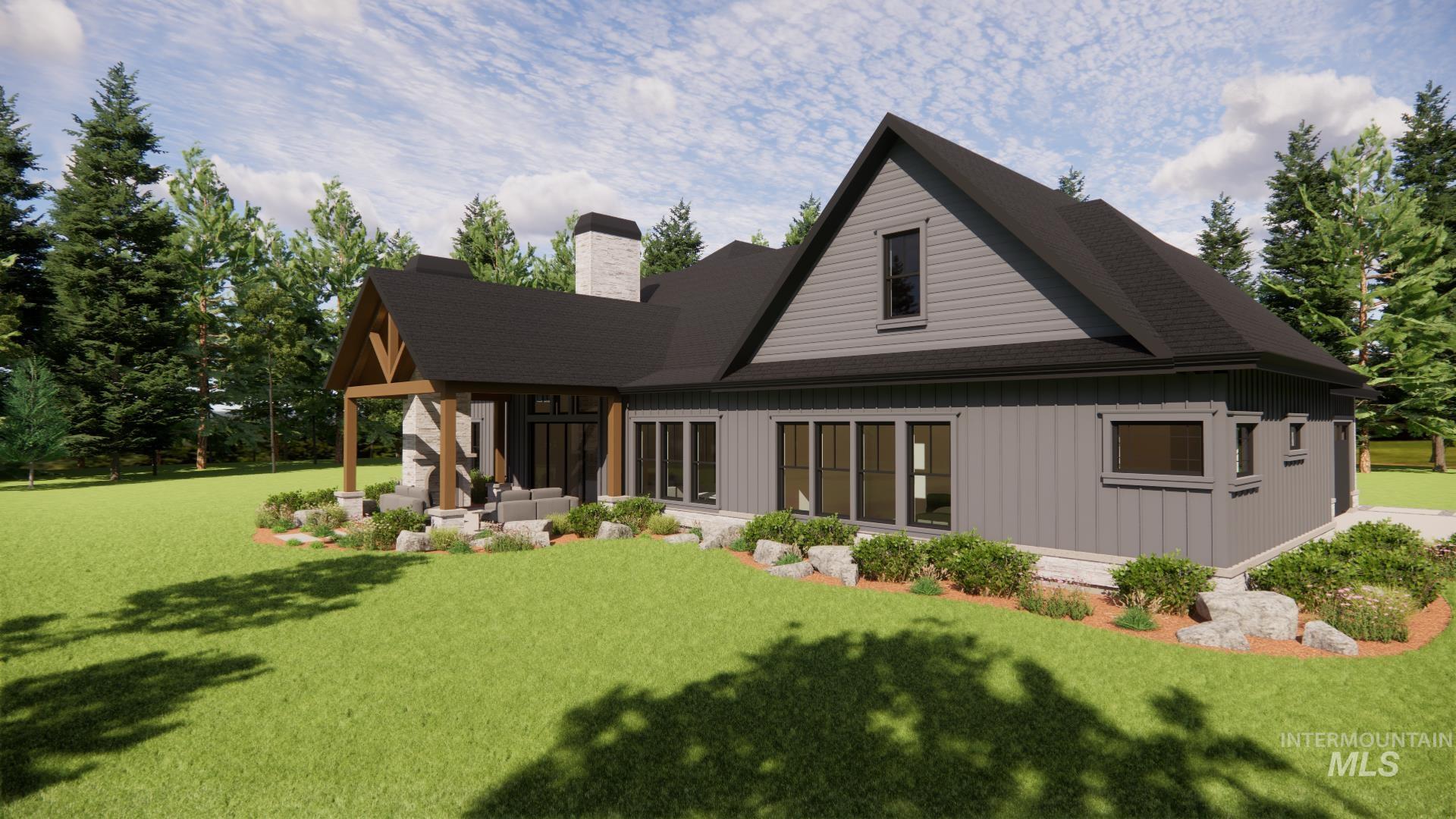 13910 Sky View Court, Unit 8 McCall, ID 83638 - Photo 15 of 40 Back of property with a yard, a chimney, and a shingled roof