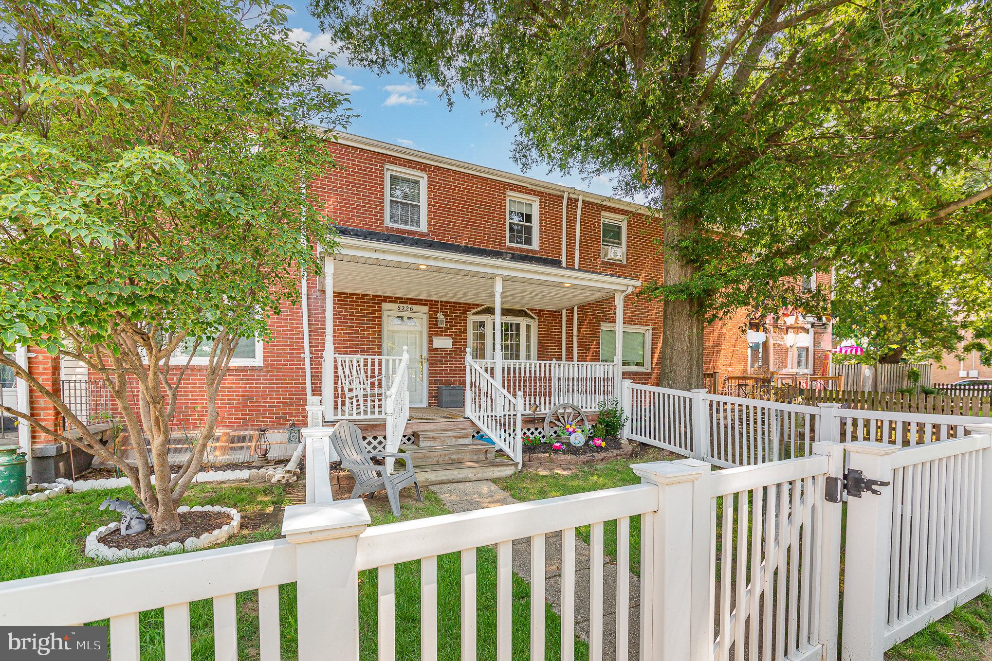 8226 North Boundary Road Baltimore, MD 21222 - Photo 1 of 37 a front view of a house with a porch