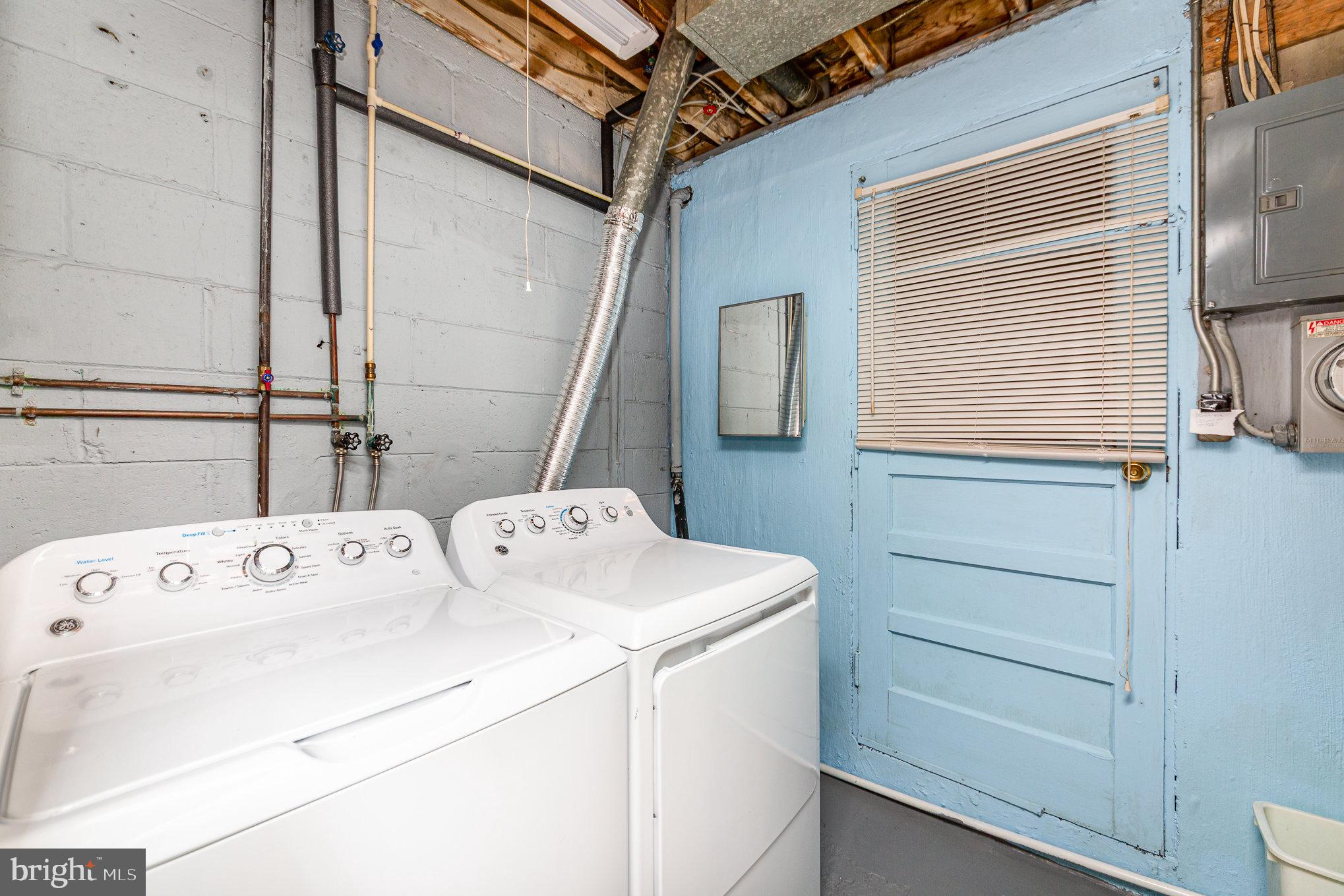 8226 North Boundary Road Baltimore, MD 21222 - Photo 29 of 37 a utility room with dryer and washer