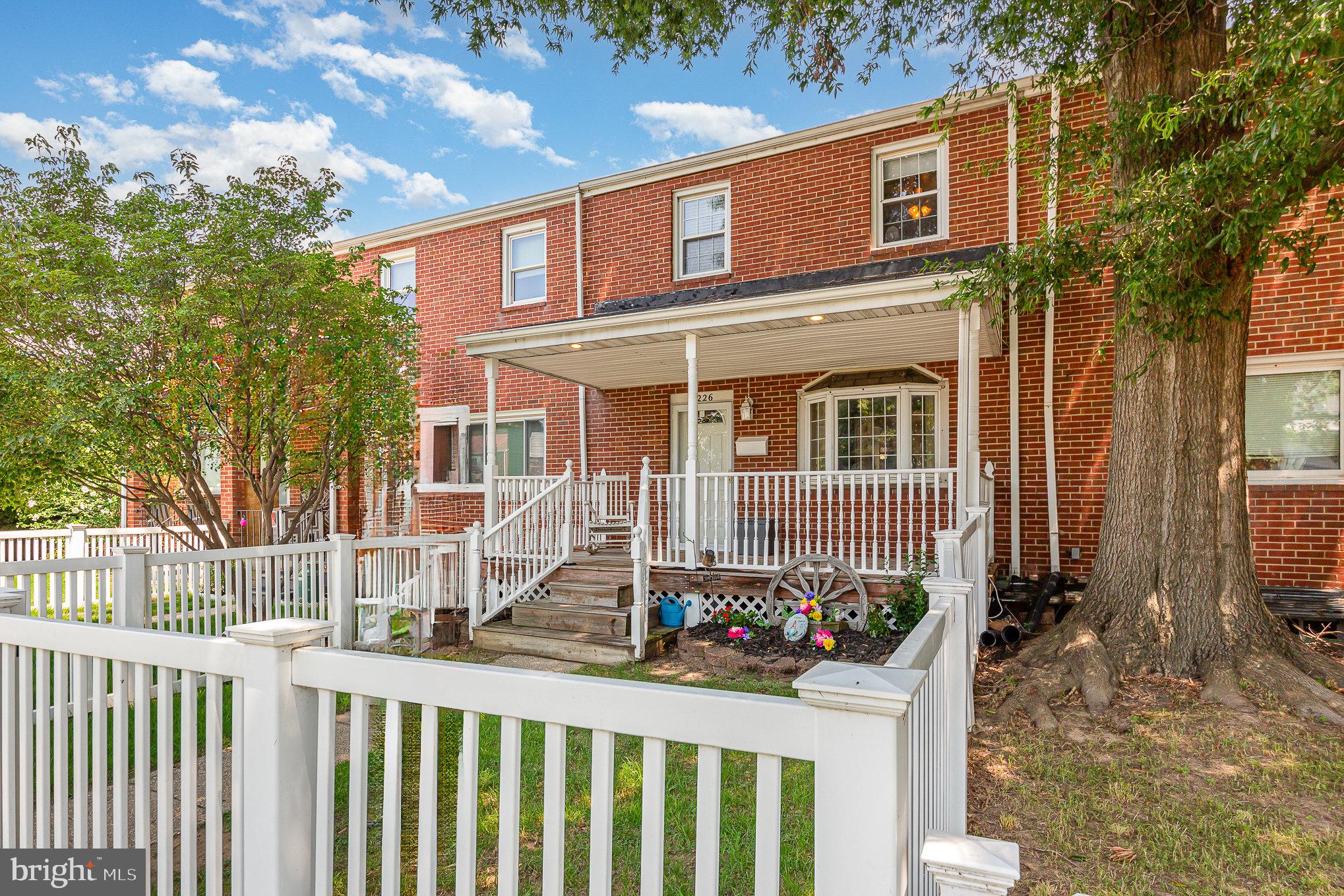 8226 North Boundary Road Baltimore, MD 21222 - Photo 3 of 37 a front view of a house with a porch