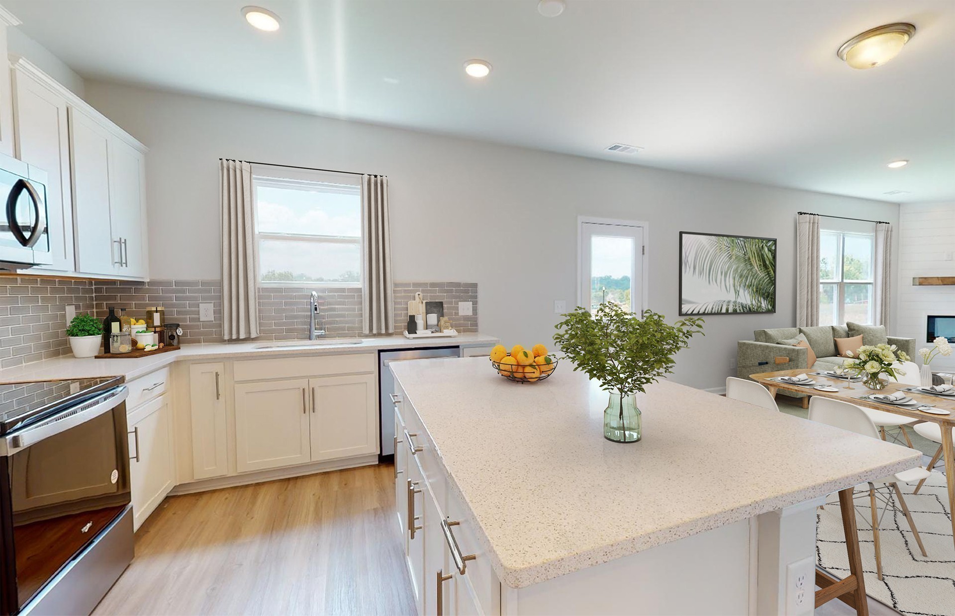 486 Jet Strm Drive La Vergne, TN 37086 - Photo 4 of 27 a kitchen with a white table and chairs