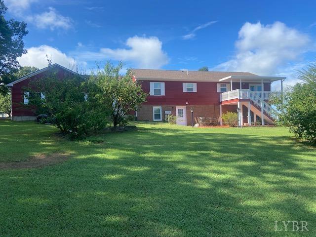 1934 New Chapel Road Rustburg, VA 24588 - Photo 3 of 80 a view of a big yard with a house