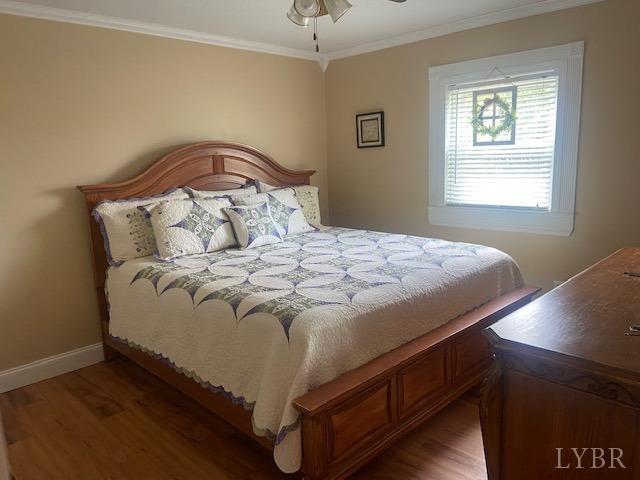 1934 New Chapel Road Rustburg, VA 24588 - Photo 38 of 80 a bed sitting in a bedroom next to a window