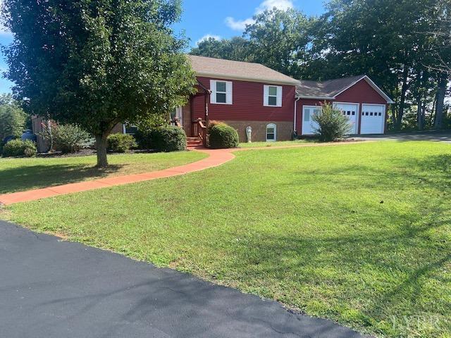 1934 New Chapel Road Rustburg, VA 24588 - Photo 50 of 80 a view of a yard in front of a house with a large tree
