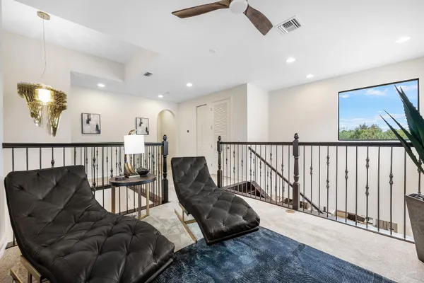 a view of a porch with a floor to ceiling window