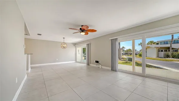 a kitchen with stainless steel appliances a refrigerator sink and cabinets