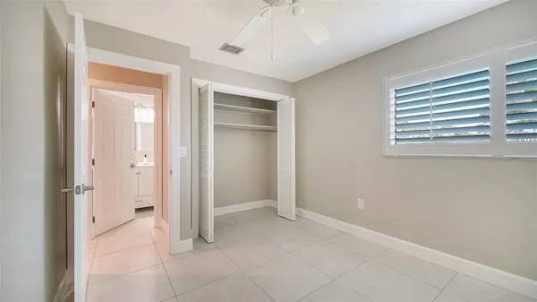 a view of a swimming pool with a lounge chairs