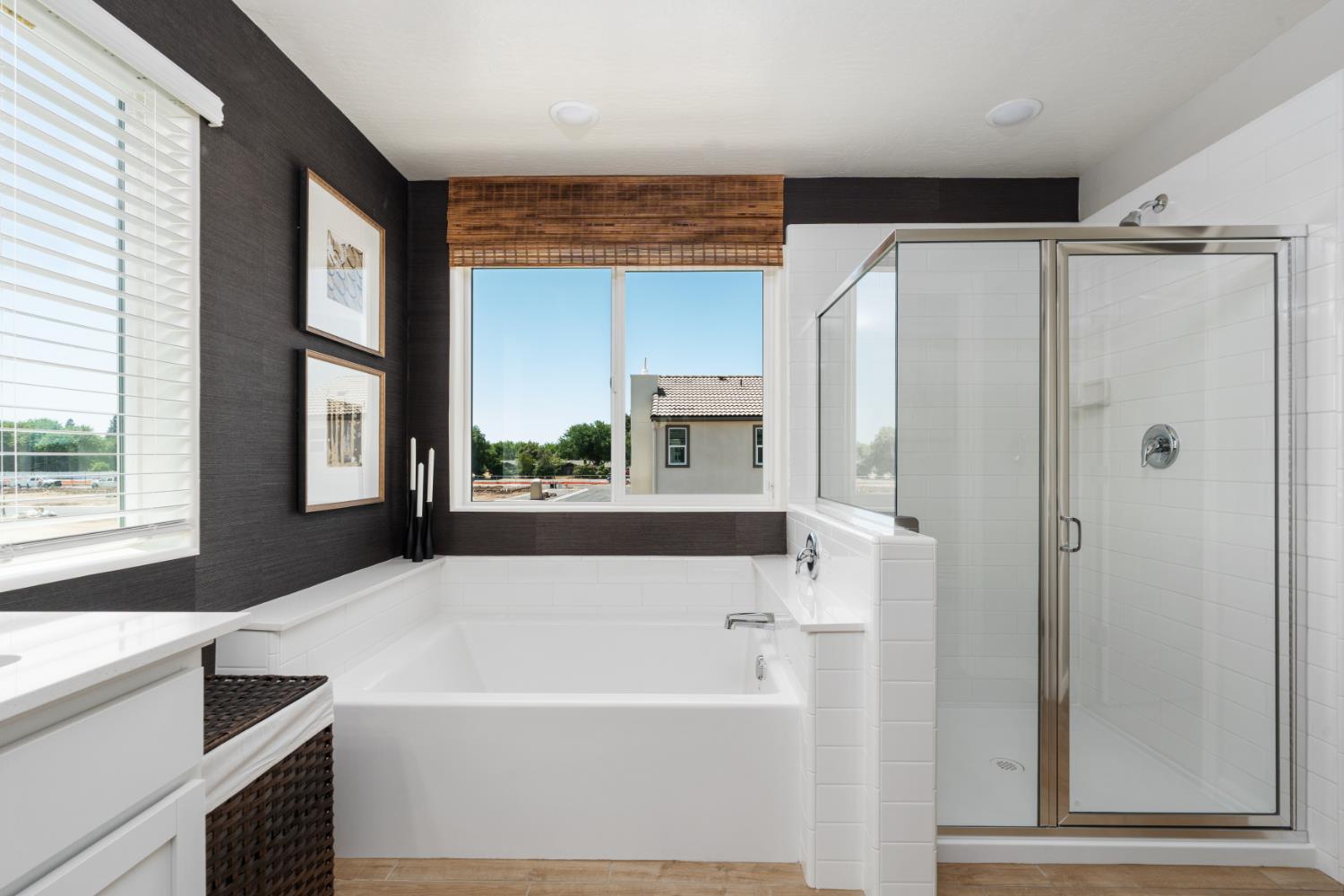 1502 Redbrick Lane Clovis, CA 93619 - Photo 26 of 33 a white bath tub sitting in a bathroom next to a window