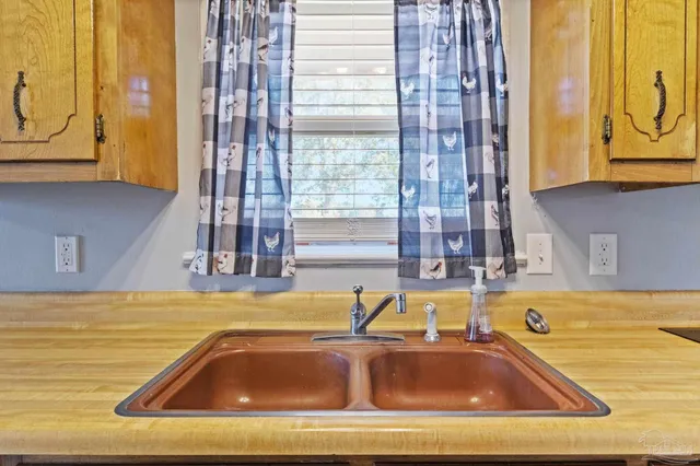 a view of a kitchen counter top of a house