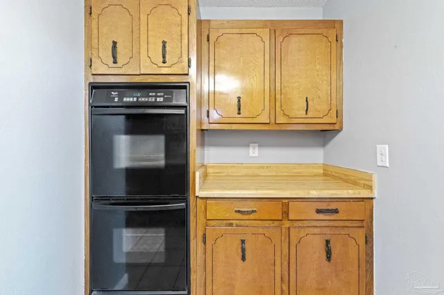 a view of room with rack on the wall