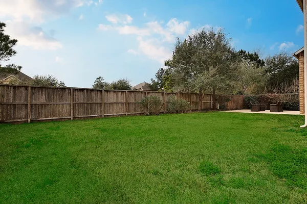 a view of a backyard with a garden