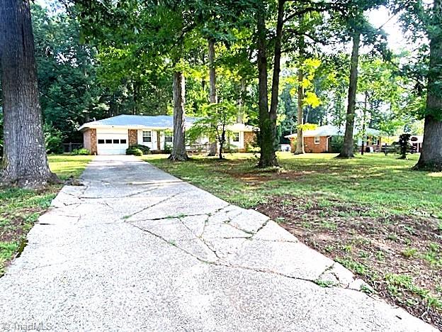 647 Hodgin Valley Road Pleasant Garden, NC 27313 - Photo 3 of 24 Paved drive.