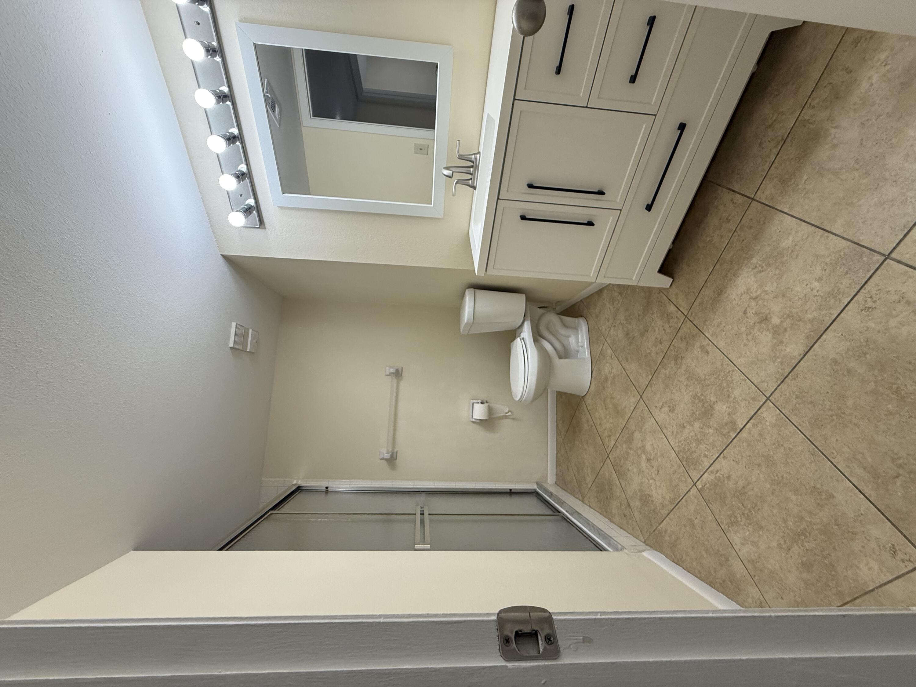 1520 Southeast Royal Green Circle, Unit K 205 Port St. Lucie, FL 34952 - Photo 6 of 18 a view of walk in closet