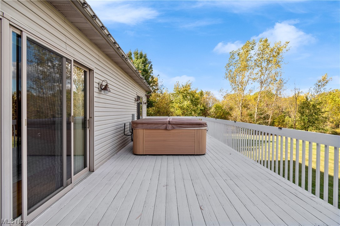 5670 South Funk Road Shreve, OH 44676 - Photo 9 of 35 Deck with a hot tub