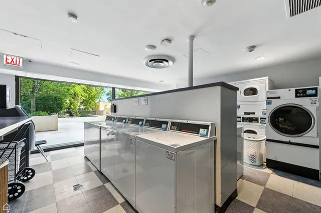 a room with furniture and a large window