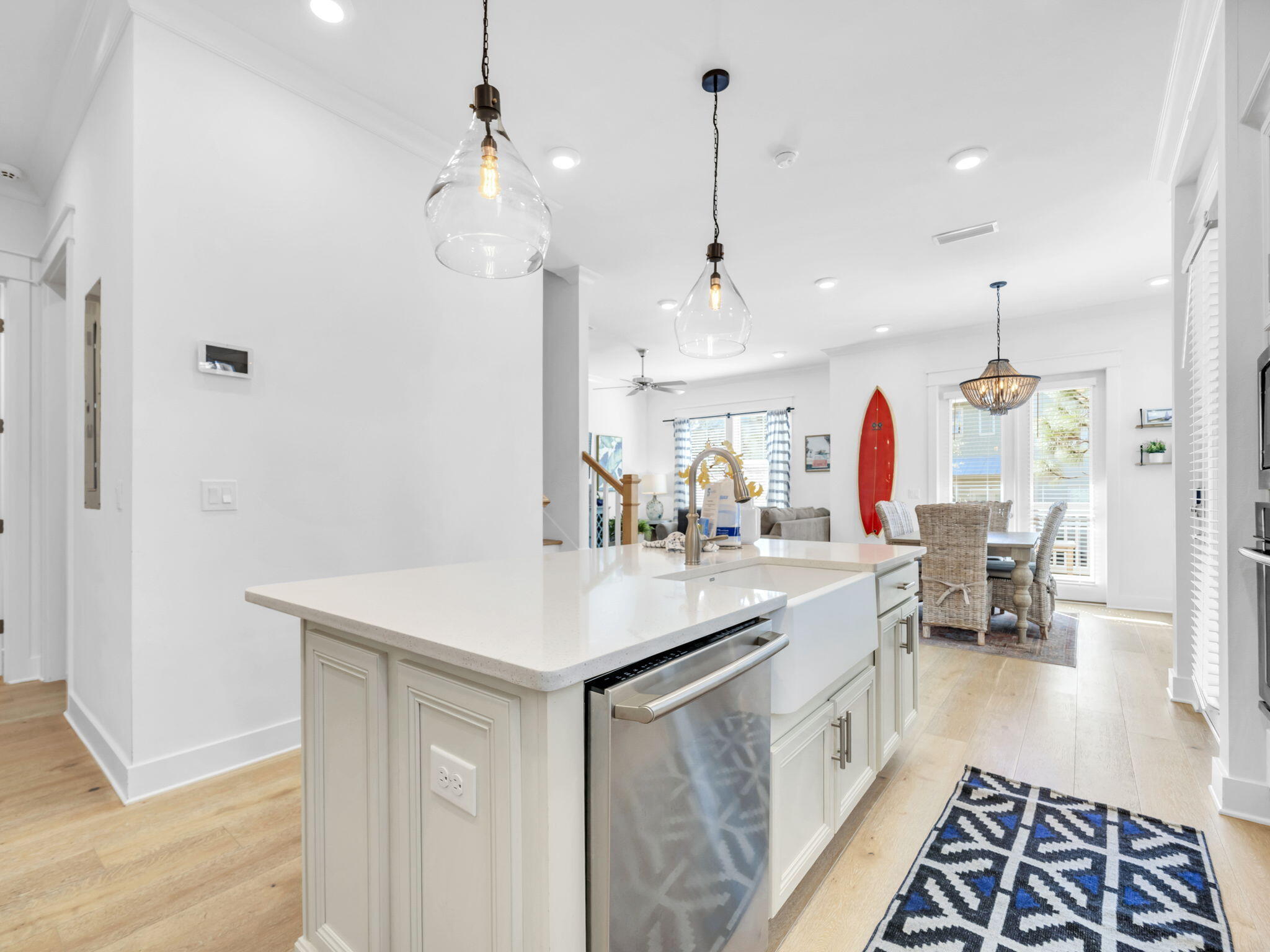 282 Milestone Dr Inlet Beach, Unit B Inlet Beach, FL 32461 - Photo 13 of 42 a kitchen with kitchen island a sink stove and refrigerator