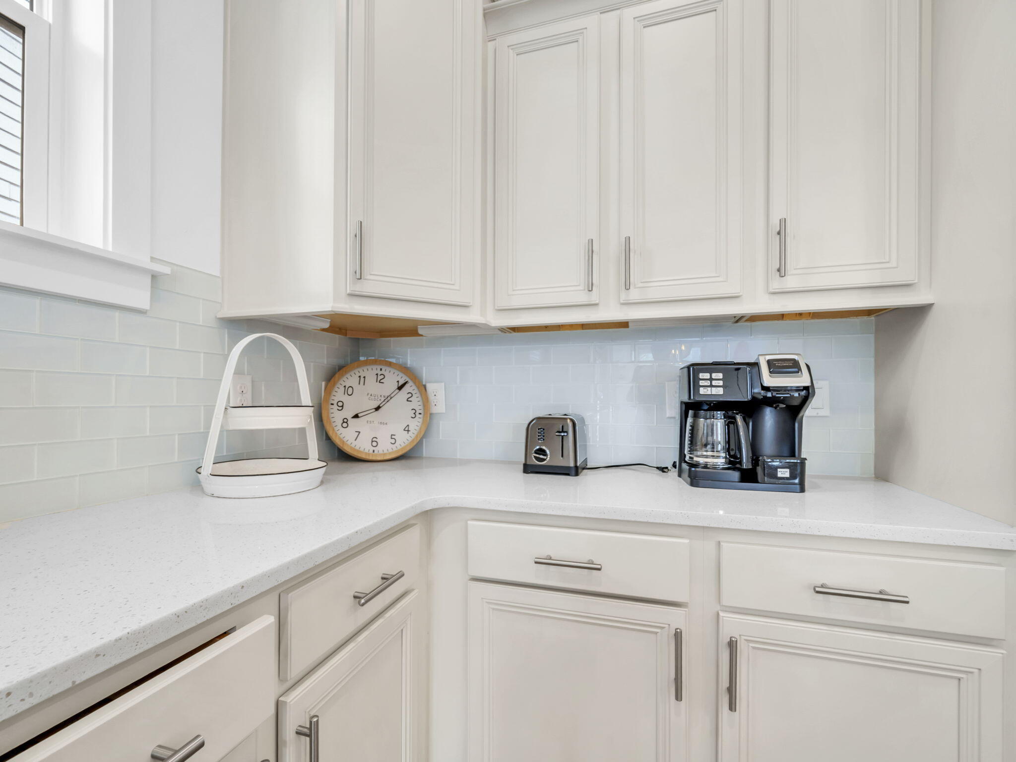 282 Milestone Dr Inlet Beach, Unit B Inlet Beach, FL 32461 - Photo 14 of 42 a kitchen with white cabinets and a sink