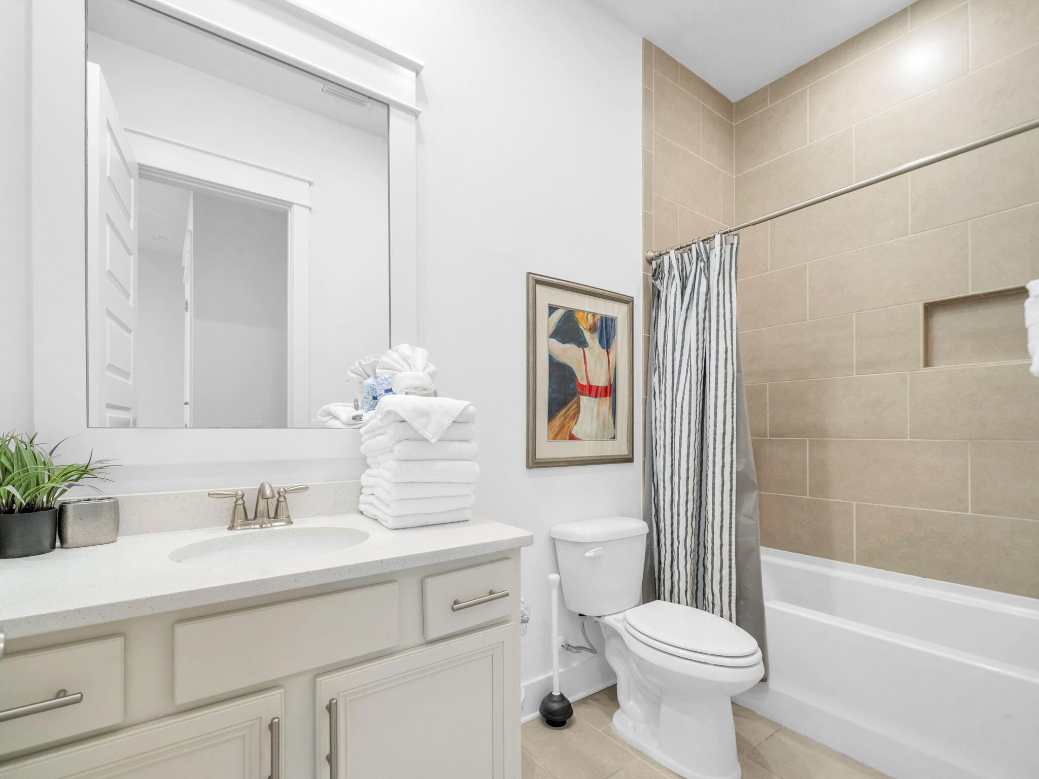 282 Milestone Dr Inlet Beach, Unit B Inlet Beach, FL 32461 - Photo 21 of 42 a bathroom with a sink toilet and shower