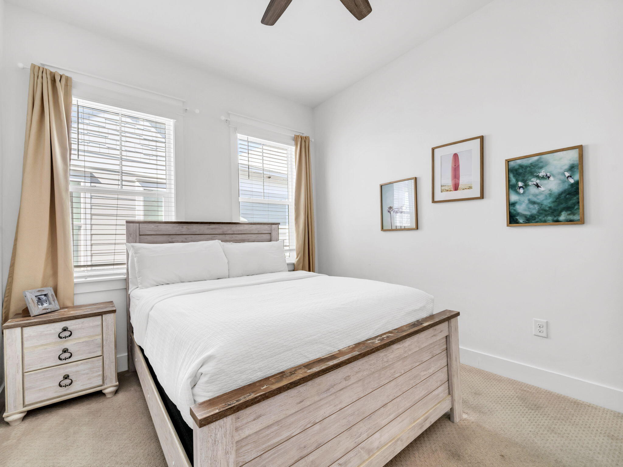 282 Milestone Dr Inlet Beach, Unit B Inlet Beach, FL 32461 - Photo 27 of 42 a bedroom with a bed and a window