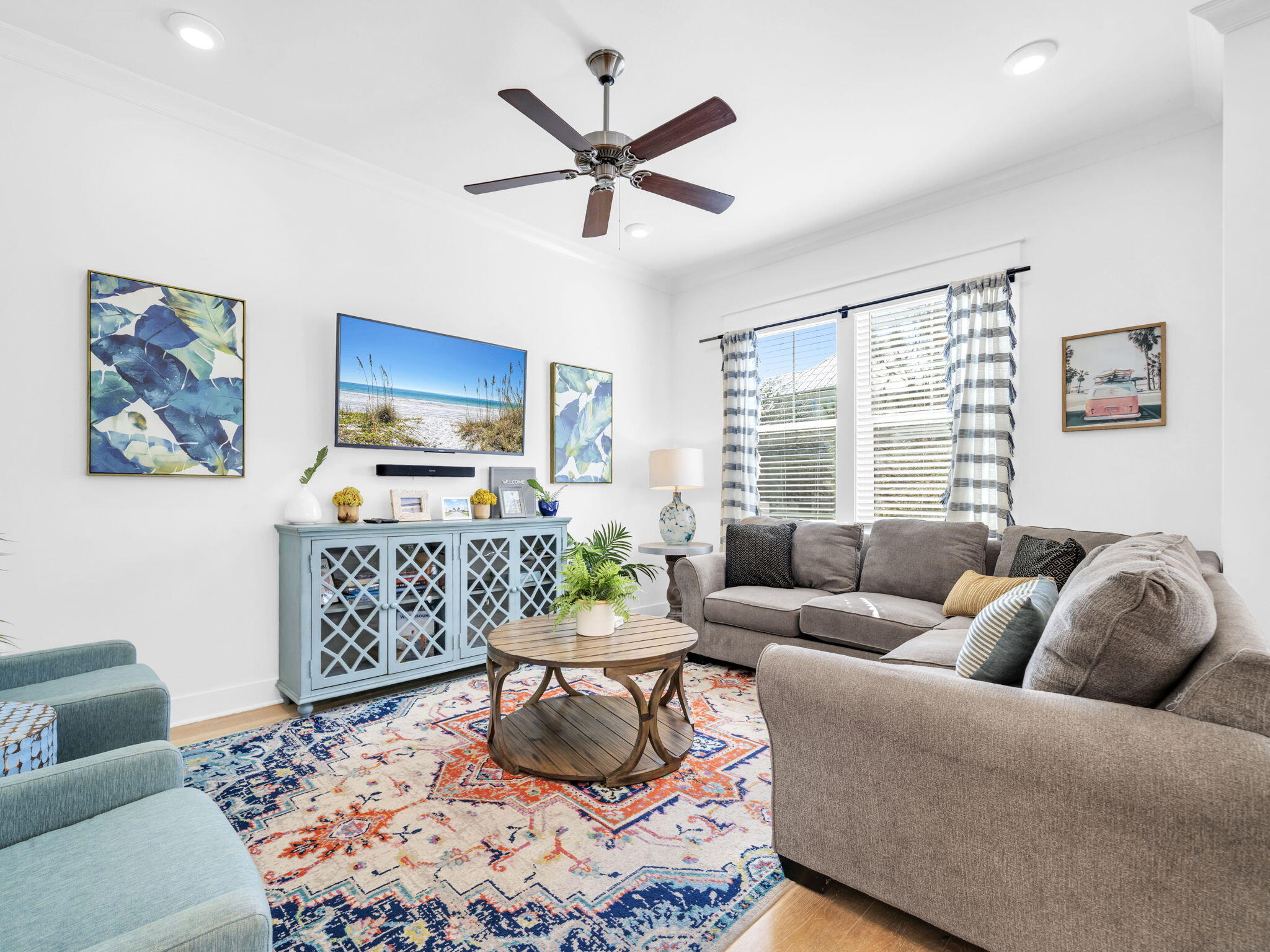 282 Milestone Dr Inlet Beach, Unit B Inlet Beach, FL 32461 - Photo 6 of 42 a living room with furniture ceiling fan and a window