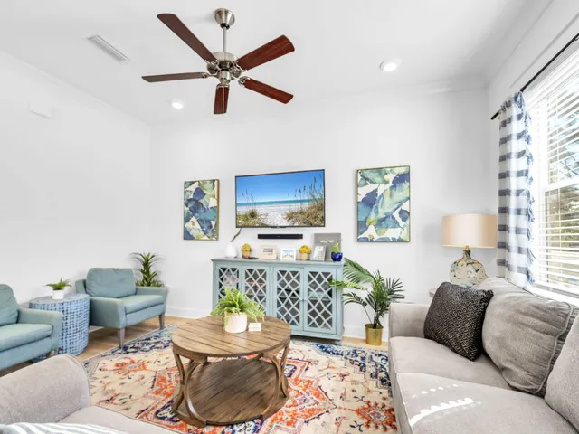 a living room with furniture and a window