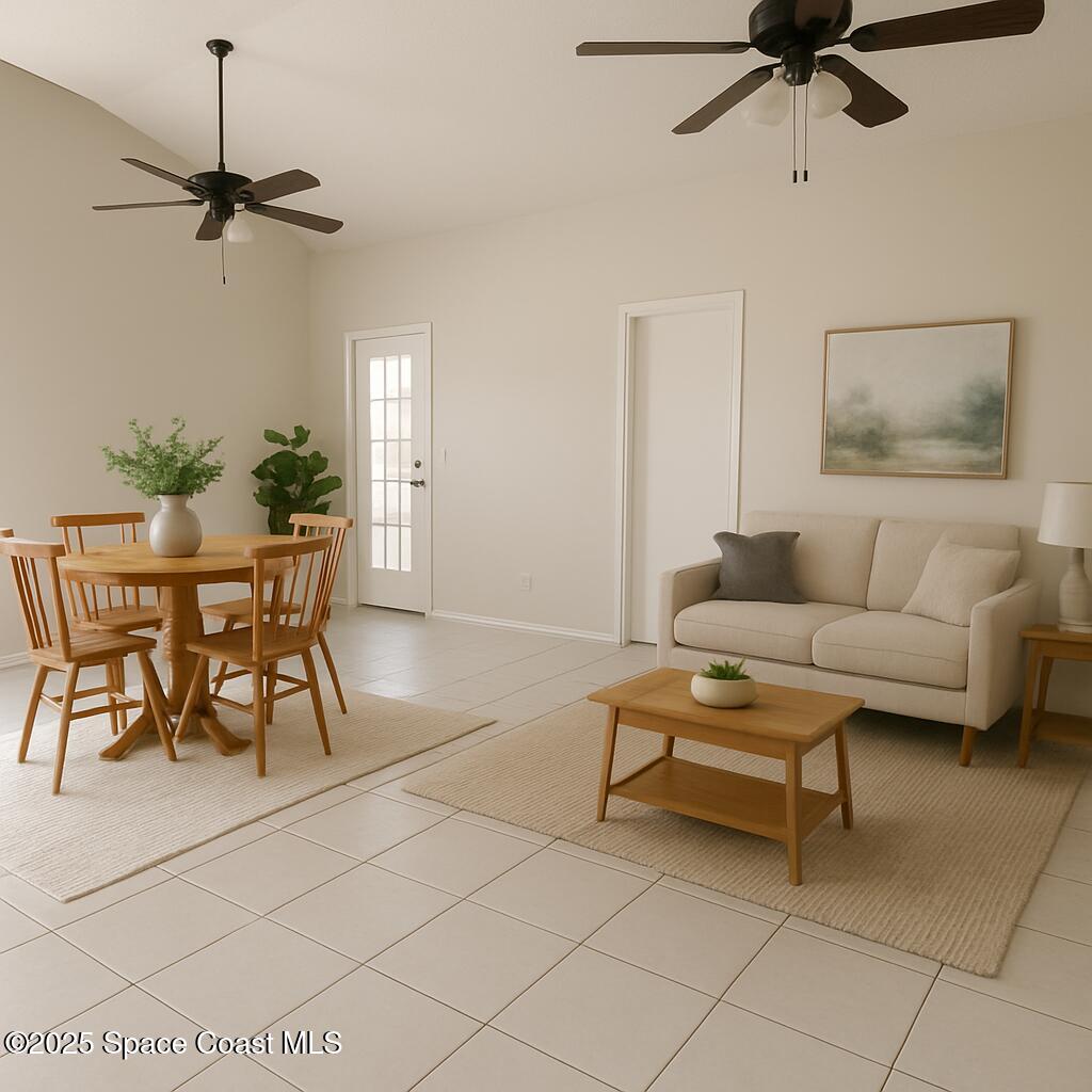 4533 Rivermist Drive Melbourne, FL 32935 - Photo 2 of 14 a living room with furniture and a window
