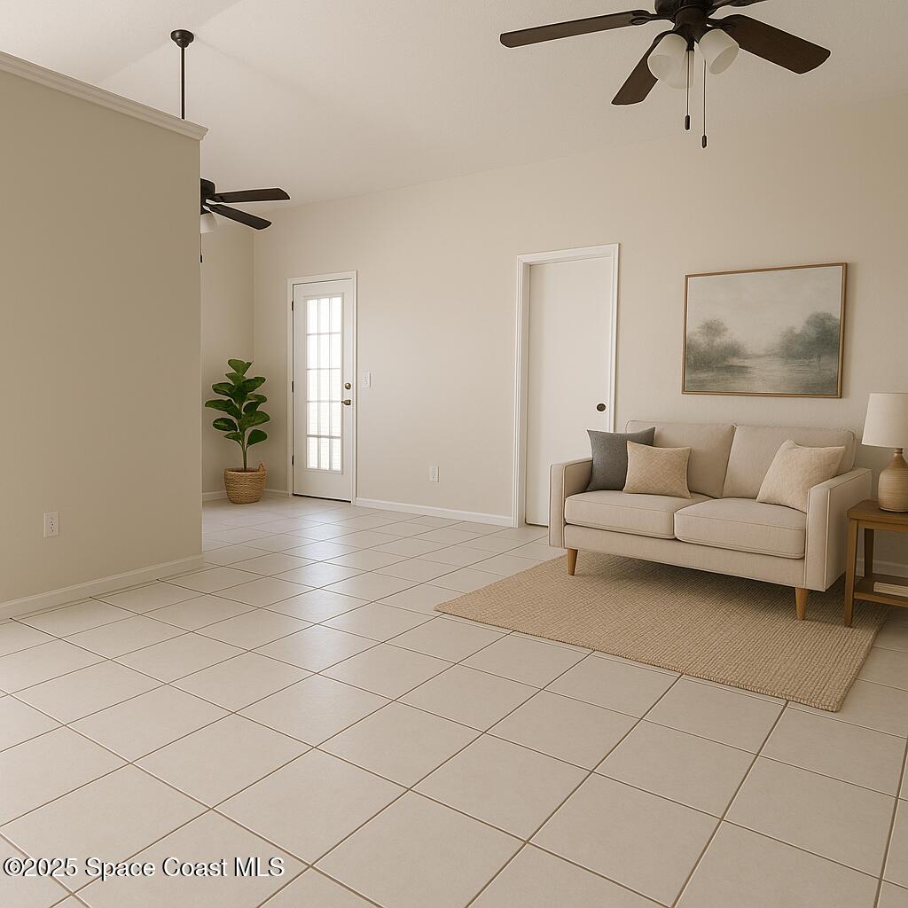 4533 Rivermist Drive Melbourne, FL 32935 - Photo 3 of 14 a living room with furniture and a ceiling fan