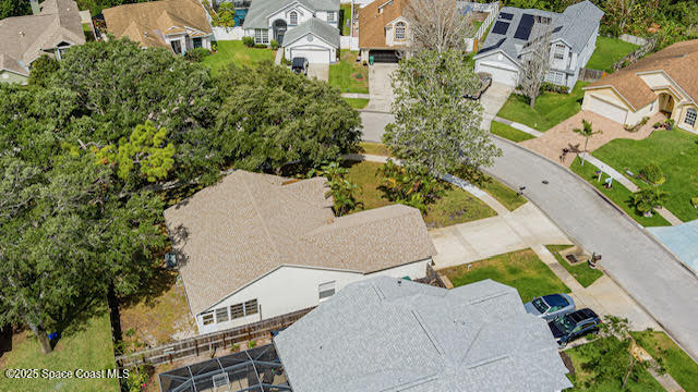 4533 Rivermist Drive Melbourne, FL 32935 - Photo 7 of 14 an aerial view of multiple houses with yard