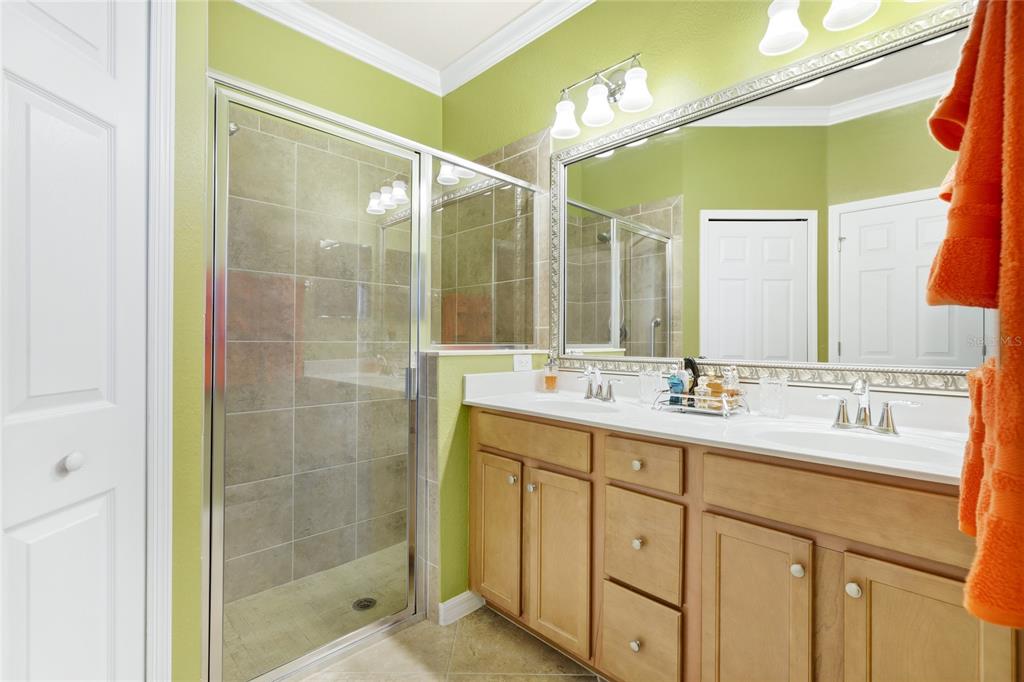 20209 Benissimo Drive Venice, FL 34293 - Photo 15 of 53 a bathroom with a double vanity sink mirror and shower