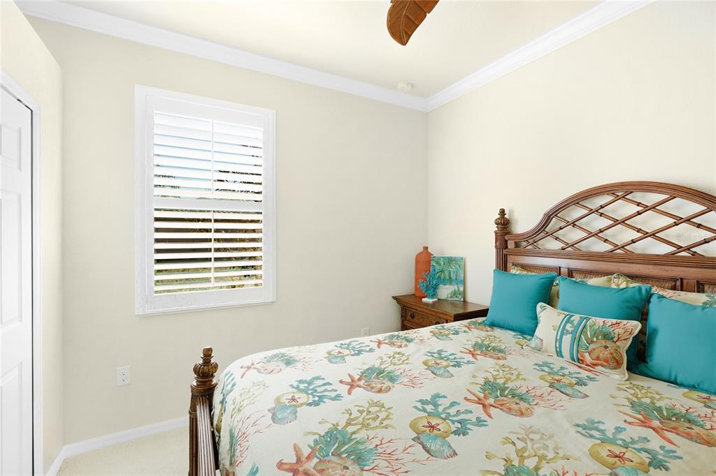 20209 Benissimo Drive Venice, FL 34293 - Photo 17 of 53 a bedroom with a bed and a window