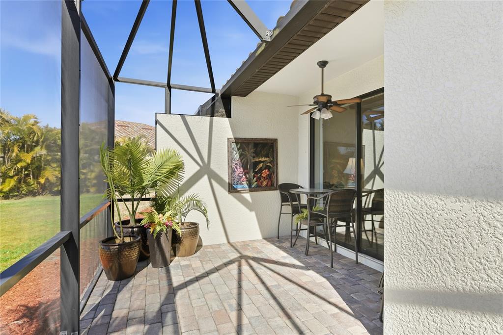 20209 Benissimo Drive Venice, FL 34293 - Photo 19 of 53 a view of a balcony with chairs and wooden floor