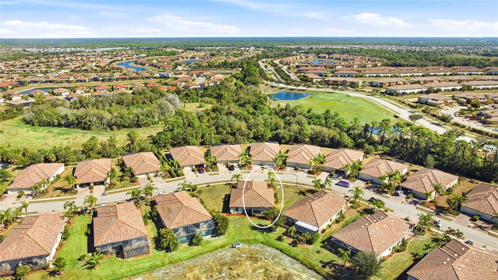 20209 Benissimo Drive Venice, FL 34293 - Photo 20 of 53 an aerial view of residential houses with outdoor space