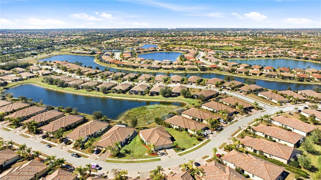 20209 Benissimo Drive Venice, FL 34293 - Photo 22 of 53 an aerial view of residential houses with outdoor space