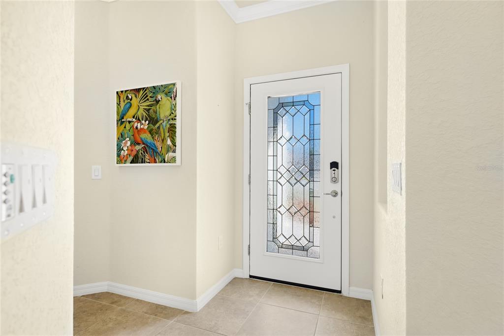 20209 Benissimo Drive Venice, FL 34293 - Photo 3 of 53 a view of front door with wooden floor
