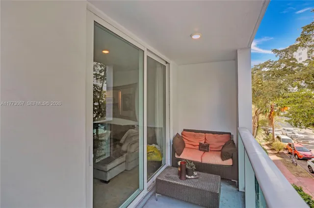 a bench is sitting in front of a building