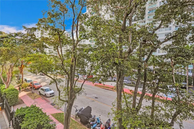 a bench is sitting in front of a building