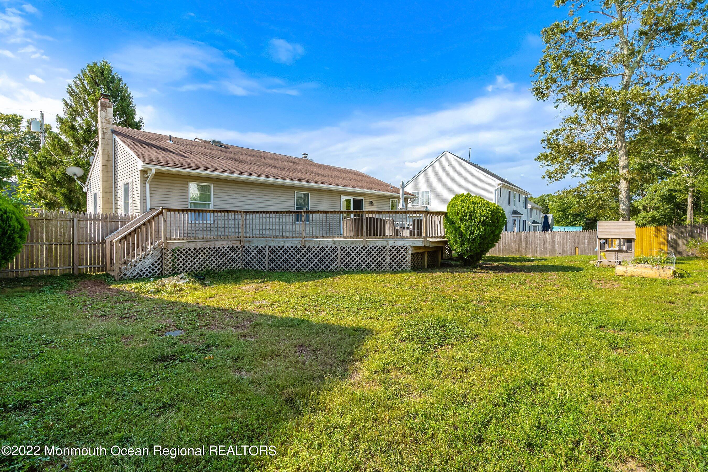 116 Seaspray Road Manahawkin, NJ 08050 - Photo 27 of 28 28-Ext6 RearLeft