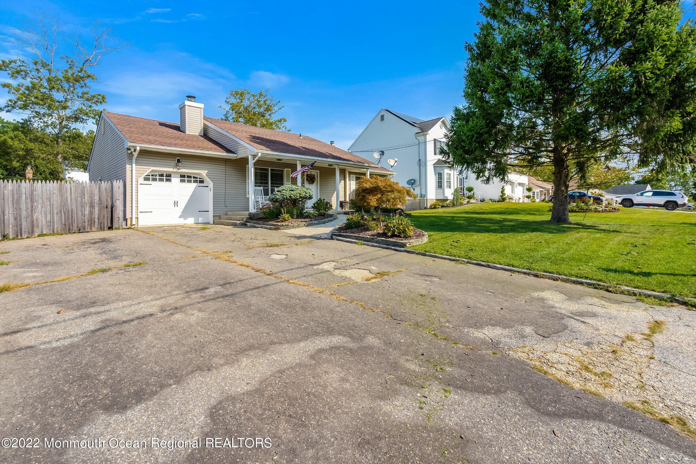 116 Seaspray Road Manahawkin, NJ 08050 - Photo 3 of 28 03-Ext7 FrontLeft