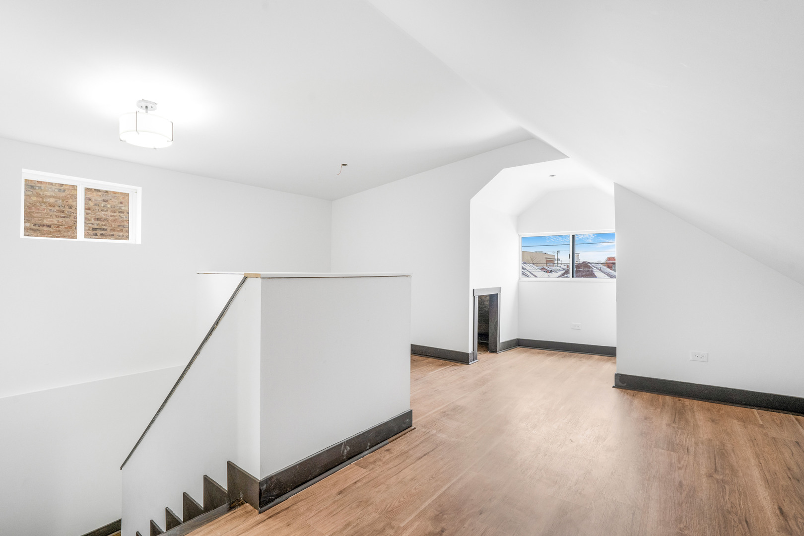 5526 South Albany Avenue Chicago, IL 60629 - Photo 16 of 25 a view of a hallway with kitchen and a refrigerator