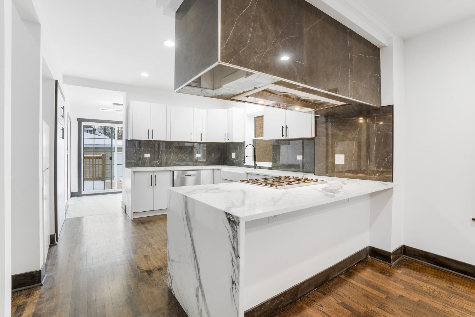 5526 South Albany Avenue Chicago, IL 60629 - Photo 5 of 25 a view of kitchen with cabinets and wooden floor