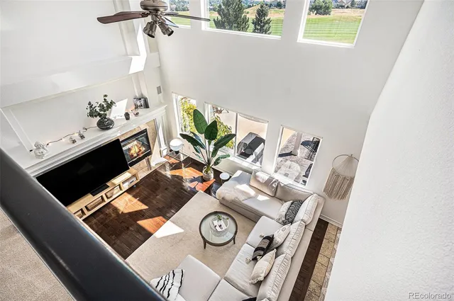 a living room with furniture and window