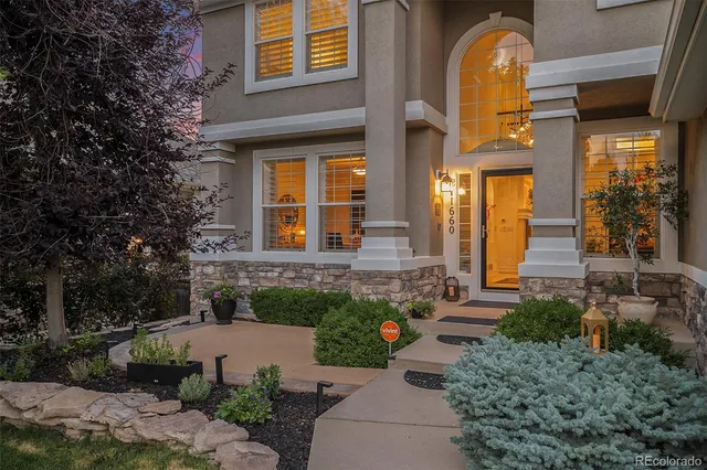 a front view of a house having yard