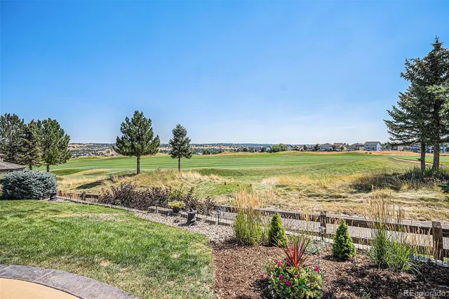 a view of a lake with a big yard