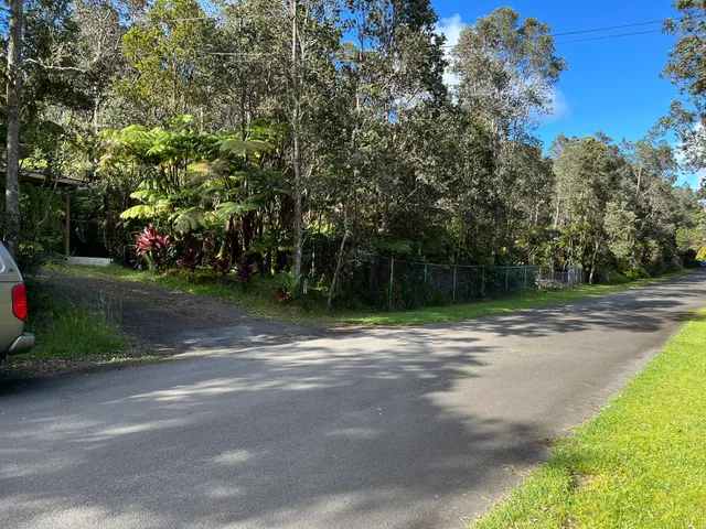 a backyard of a house with lots of green space