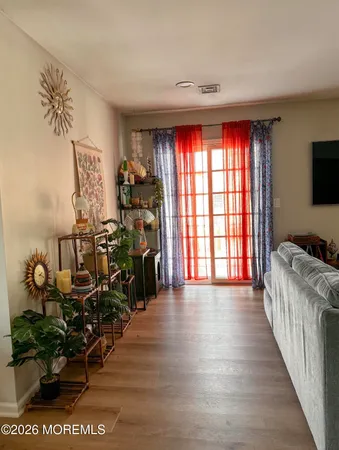 a bedroom with a bed and a dressers