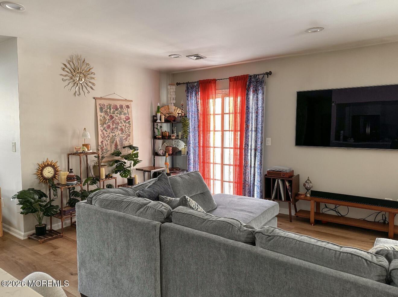 22 Alexandria Way Basking Ridge, NJ 07920 - Photo 19 of 31 a living room with furniture tv and a window